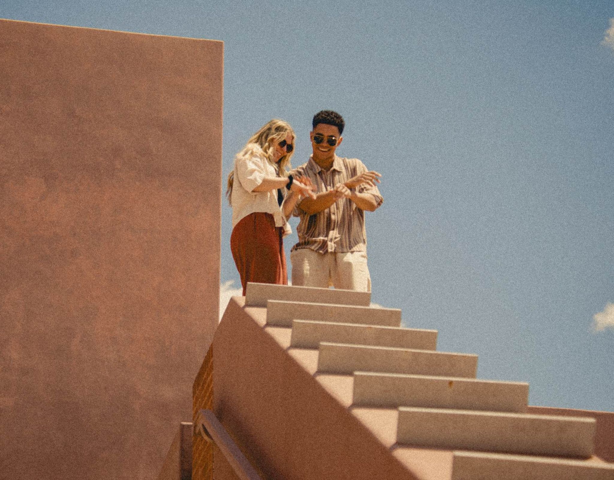 Two students standing on stairs at VERVE Orlando